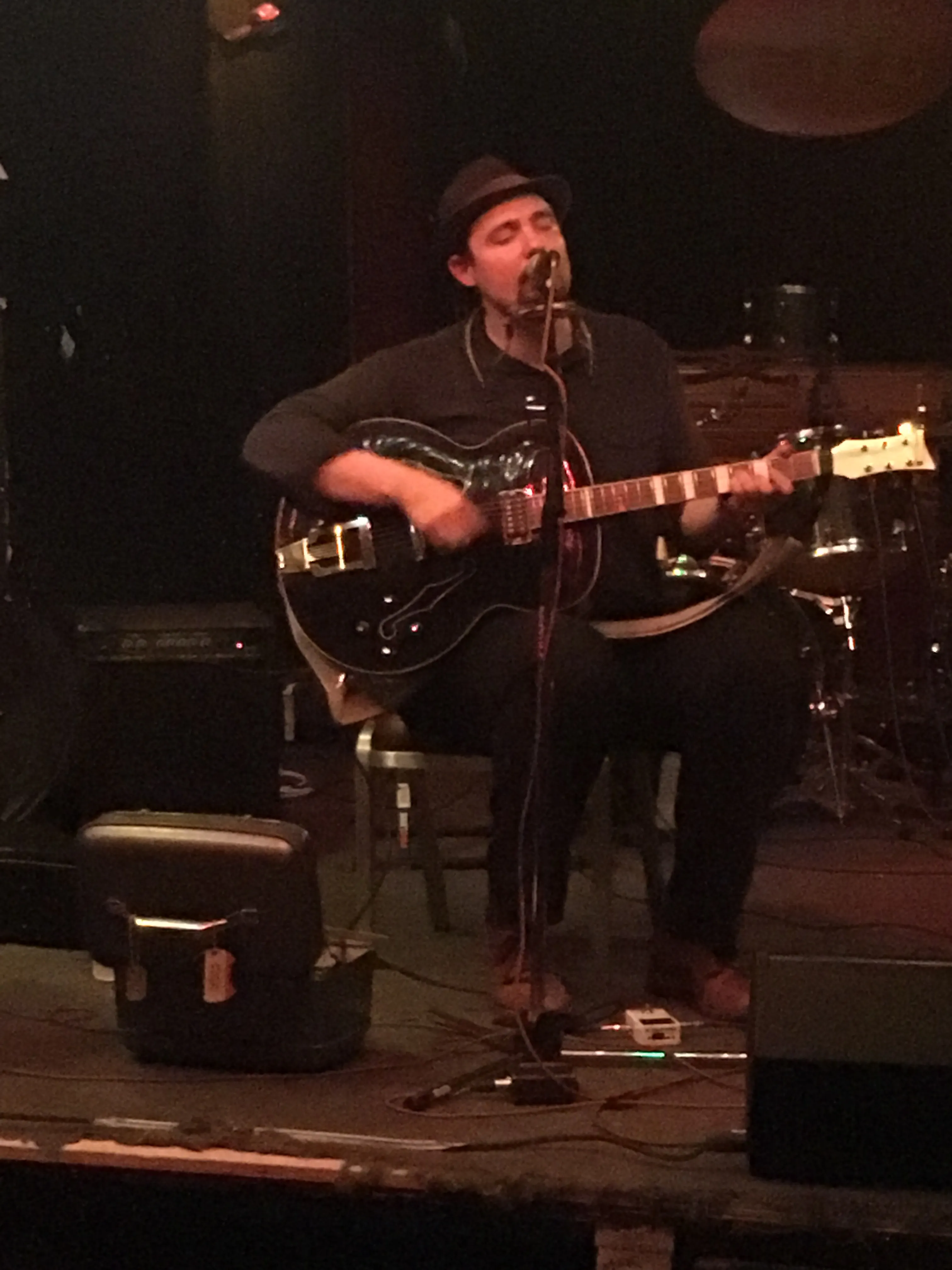 image of dan playing guitar
